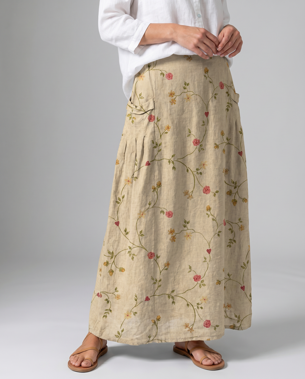 A-line pocket skirt close-up with retro floral vine print and gathered waistband