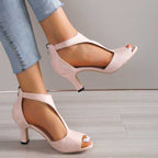 Pink slingback heeled sandals with ankle strap and peep-toe