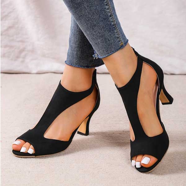 Black open-toe heeled sandals with ankle strap and block heel