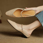 Beige orthopedic leather mules with slingback strap and square buckle detail