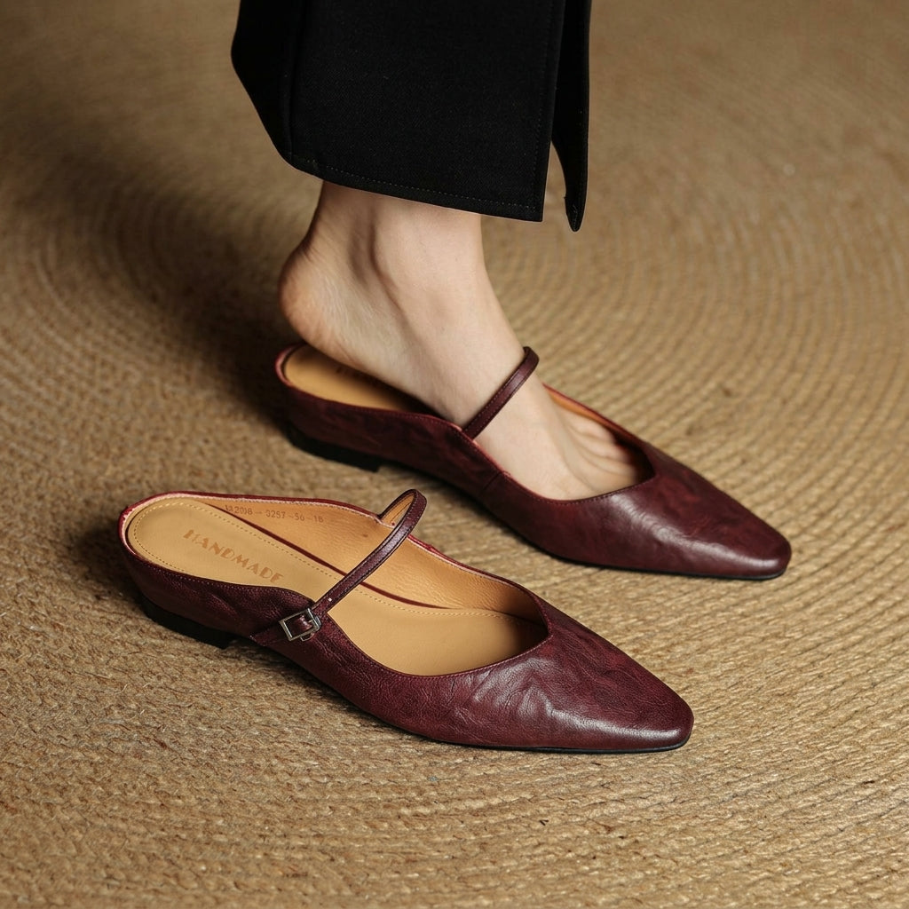 Maroon orthopedic leather mules with slingback strap and square buckle detail