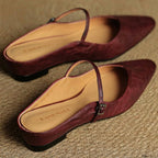 Maroon orthopedic leather mules shown side by side, slingback strap with square buckle