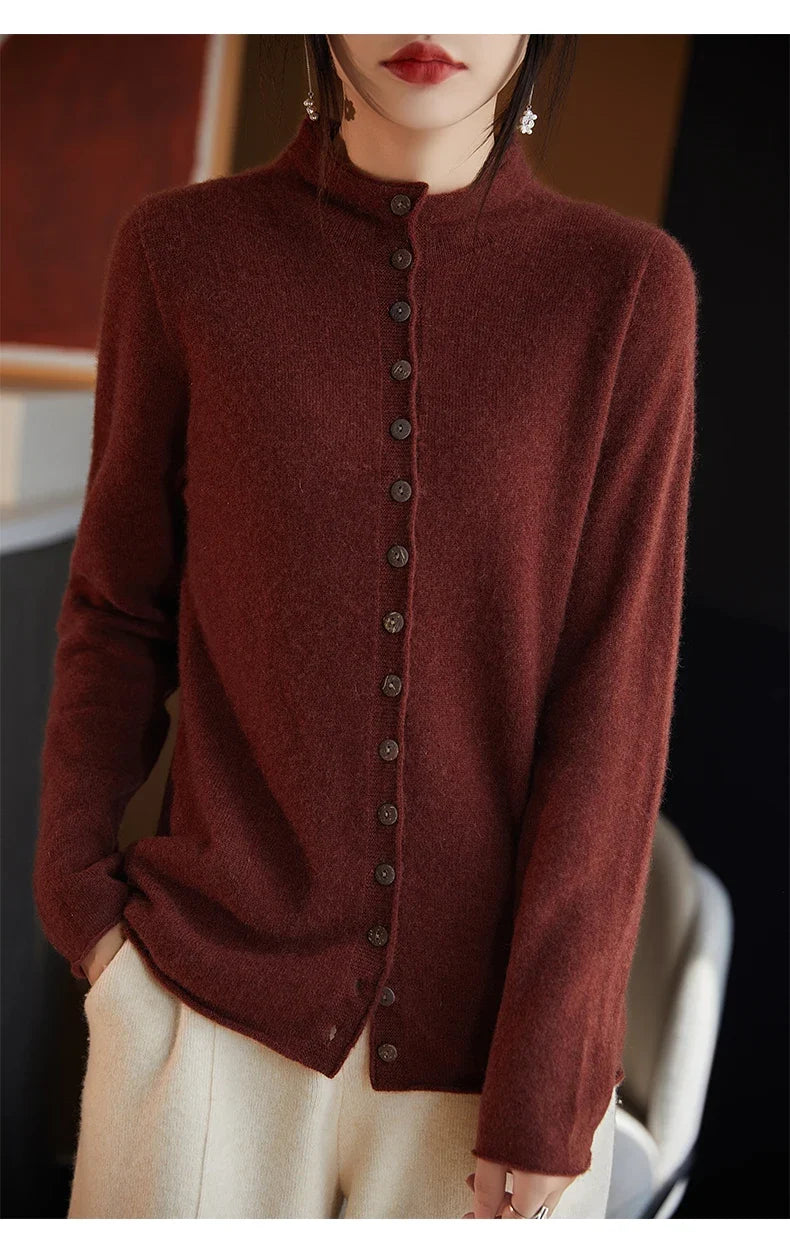 Women’s merino wool button cardigan, burgundy, button-front placket and high collar.
