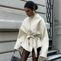 Ivory women’s wrap coat with tie waist and wide sleeves