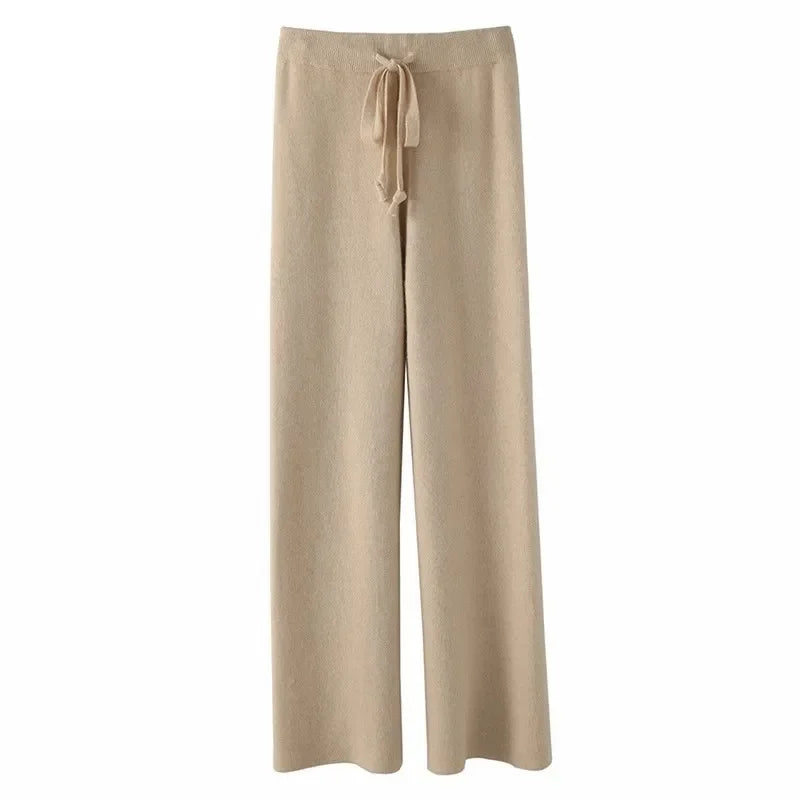 Beige wide-leg lounge pants with high elastic waistband and drawstring tie.