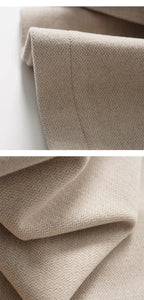Light beige wide-leg trousers with herringbone texture and clean cuff edge