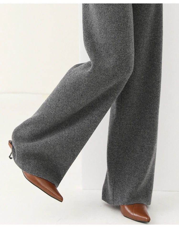 Gray heather merino wool wide-leg knit pants, wide leg opening and side seam.