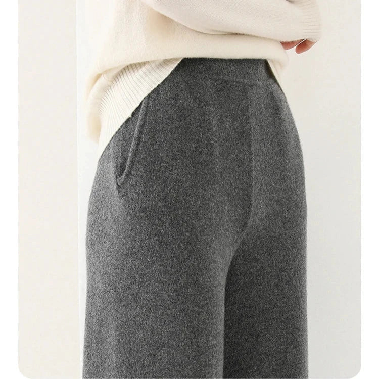 Gray merino wool wide-leg knit pants, heathered fabric with ribbed waistband.