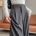 Women's high-rise wide-leg trousers, charcoal gray with belt loops and pleated front.
