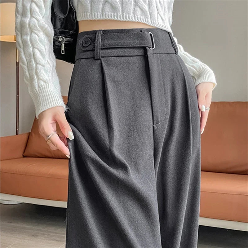 Women's high-rise wide-leg trousers, charcoal gray with belt loops and pleated front.