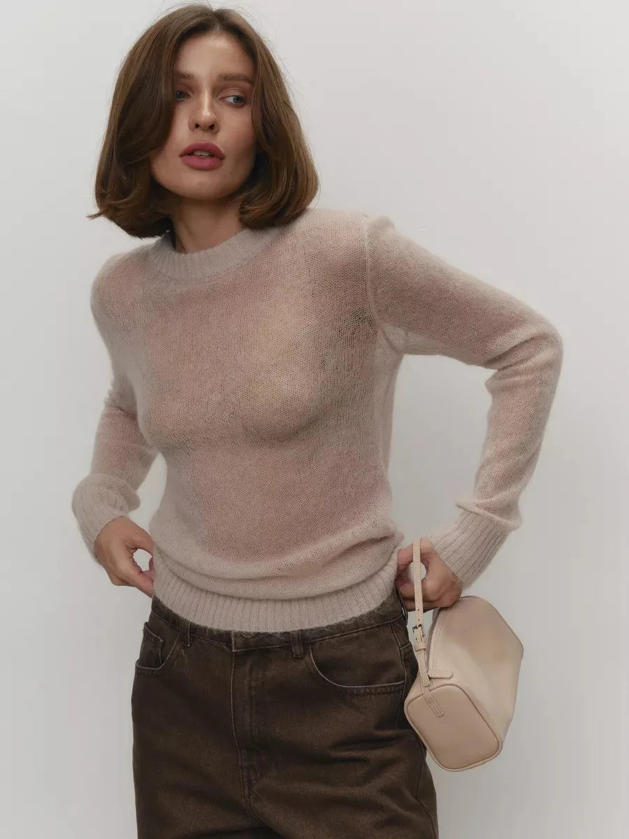Lightweight crewneck knit sweater in light beige, ribbed crew neck, hem, and cuffs
