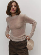 Lightweight crewneck knit sweater in light beige, ribbed crew neck, hem, and cuffs