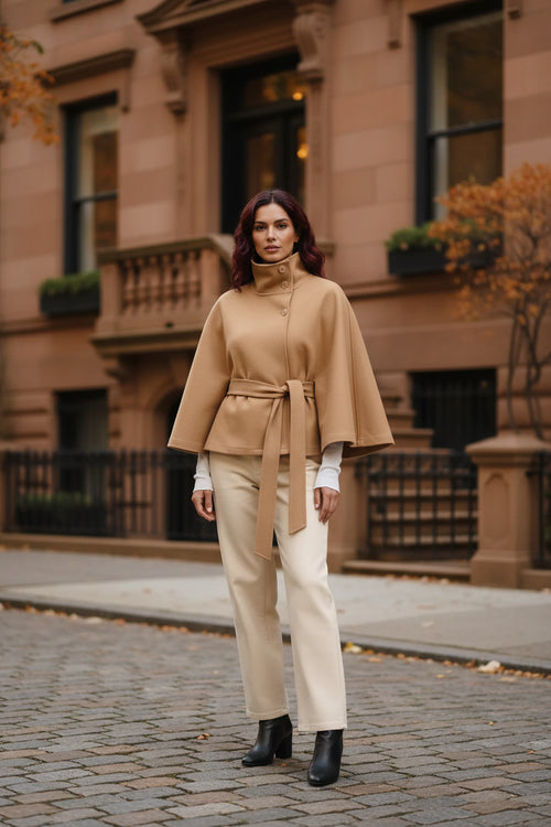Camel wool-blend cape coat with stand collar, snap buttons, and waist tie belt