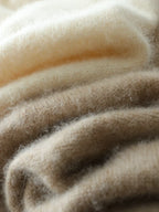 Beige crossover knit sweater sleeve knit texture