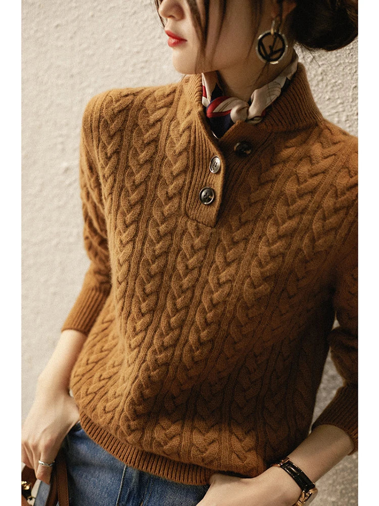 Rust-brown cable-knit cashmere sweater with button-front placket and ribbed neckline.