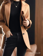 Camel wool blazer with notched lapel, two-button front, front pockets, long sleeves