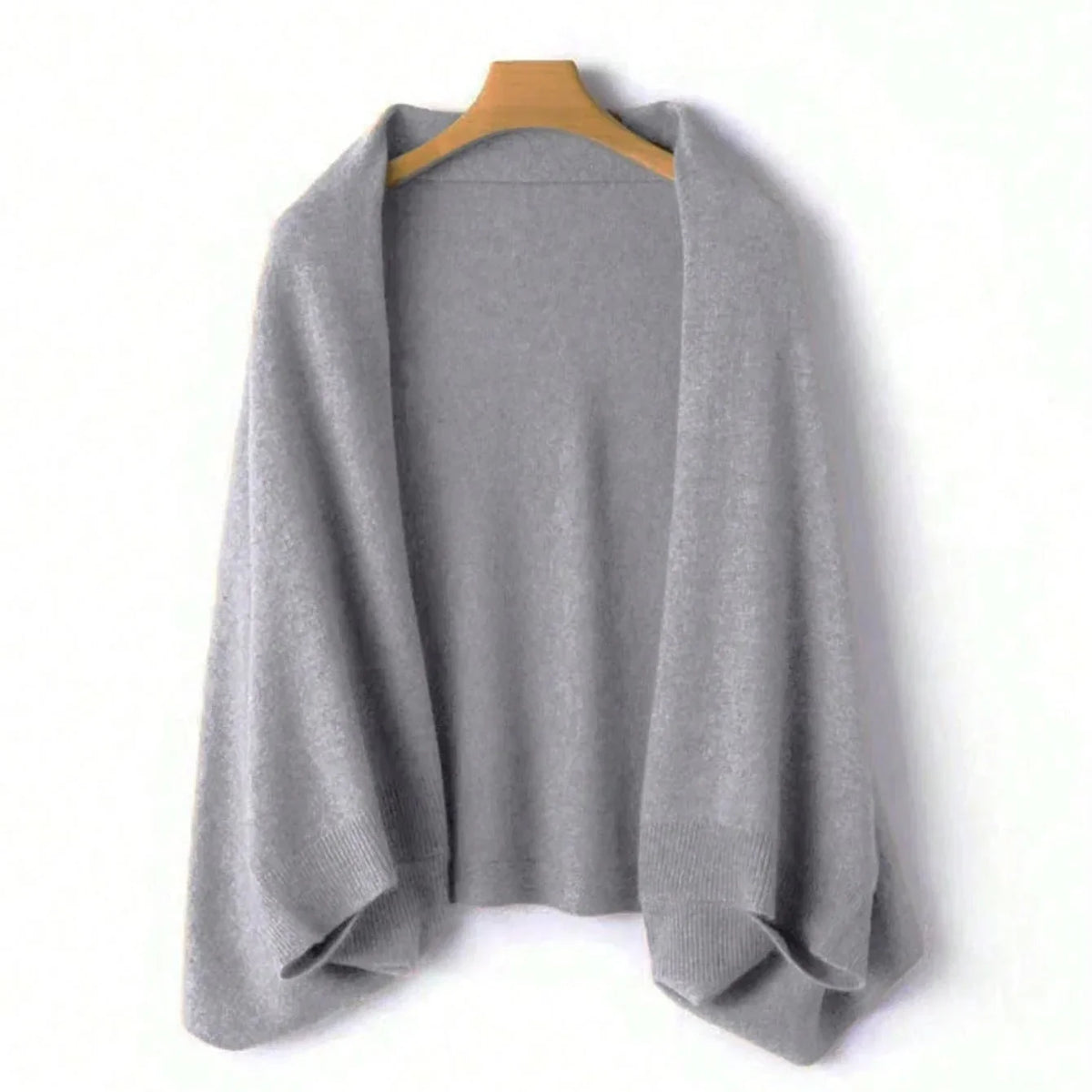 Gray wool shawl with open-front drape, knit texture, and hemmed ends