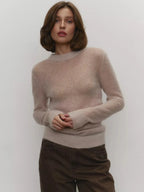 Lightweight crewneck knit sweater in light beige, ribbed crew neck and cuff details
