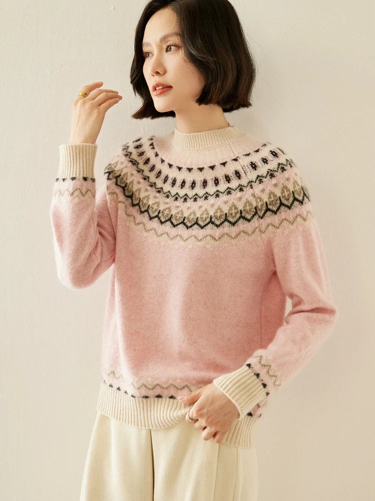 Pink mock neck fair isle knit sweater with zigzag fair isle pattern and cream ribbing