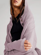 Lavender waffle zip hoodie with hood and button placket, close-up at the chest.