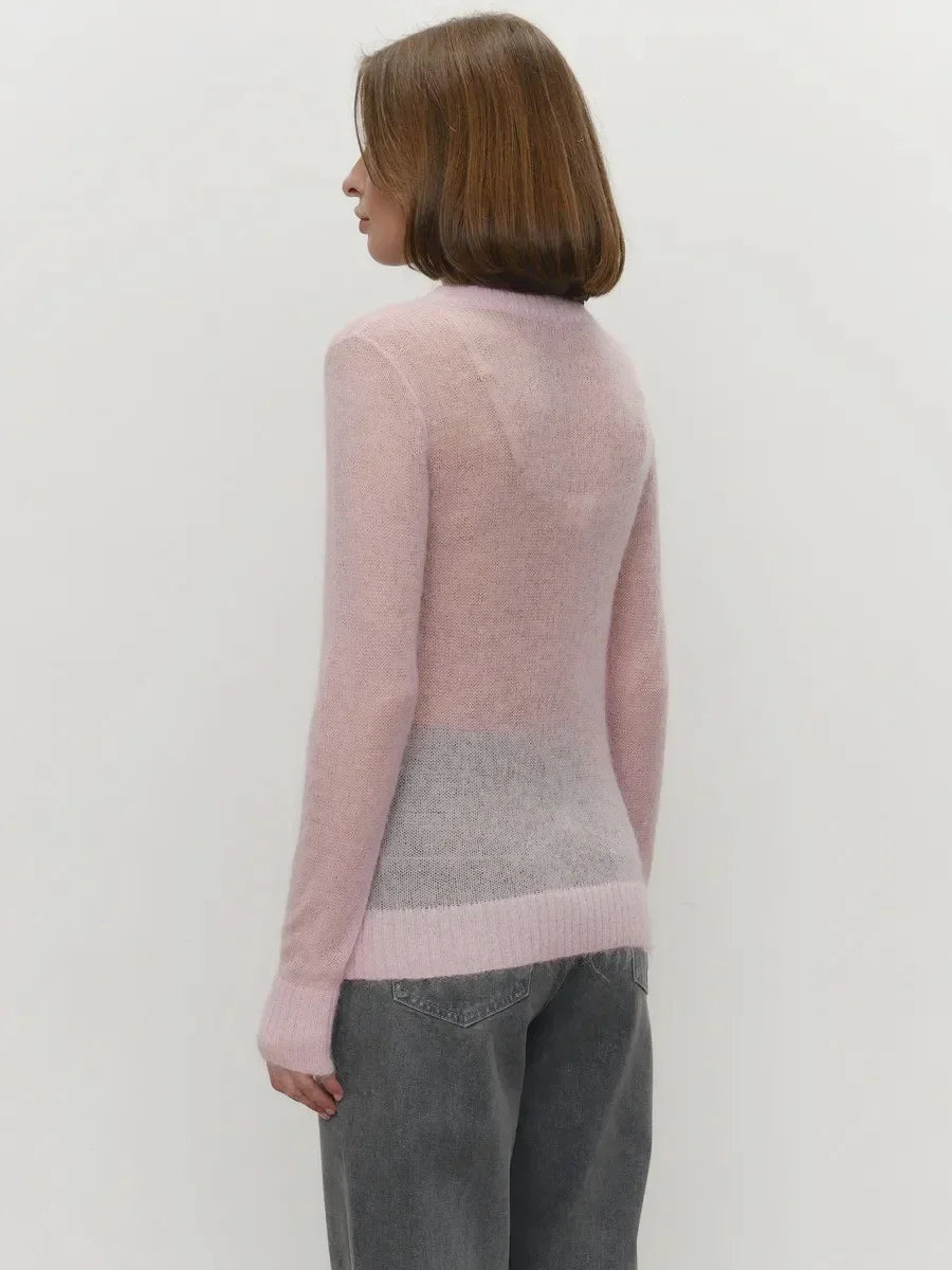 Light pink crewneck knit sweater, back view, ribbed cuffs and hem