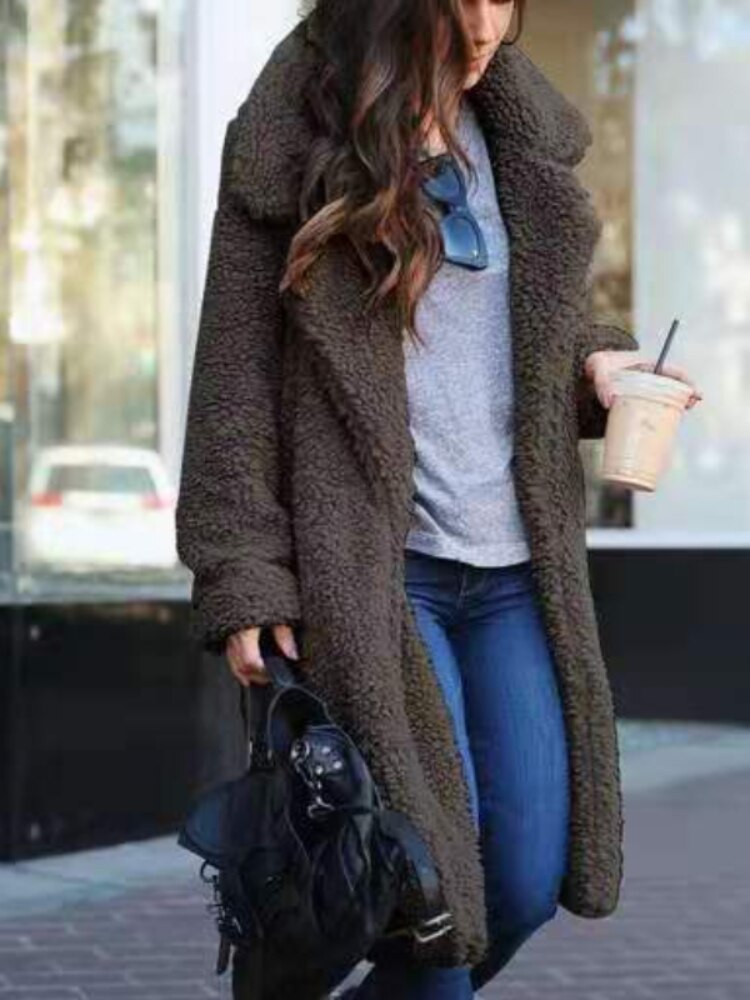 Soft long teddy fleece coat in dark charcoal, open front with wide fuzzy lapels.