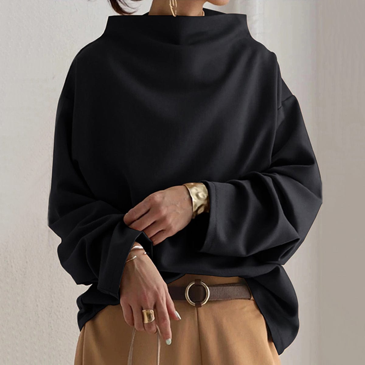 Black high-neck casual top with oversized sleeves and high collar