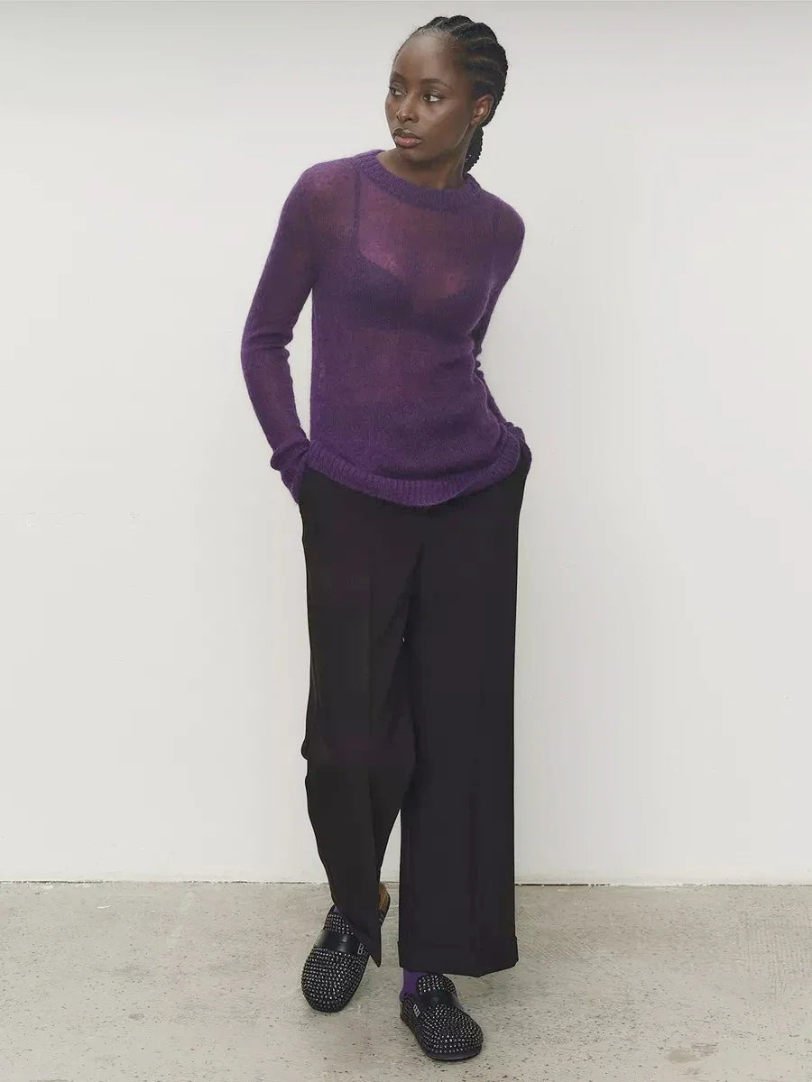 Purple crewneck knit sweater with long sleeves and ribbed trim at cuffs and hem