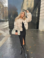 Beige teddy button jacket with toggle buttons, long sleeves, cropped length