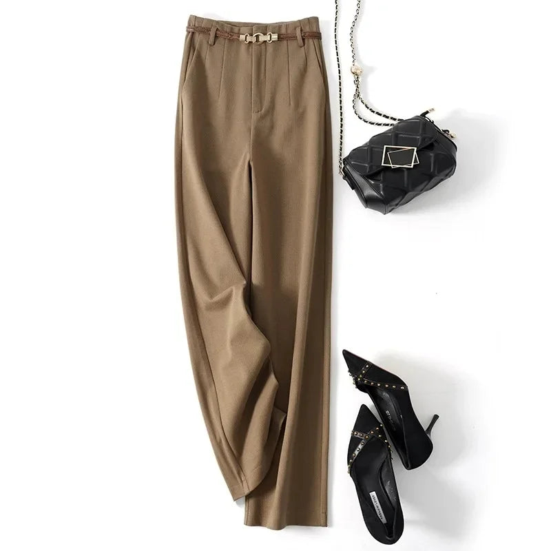 High-waisted wide-leg wool blend trousers in tan with belt detail at waistband