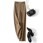 High-waisted wide-leg wool blend trousers in tan with belt detail at waistband