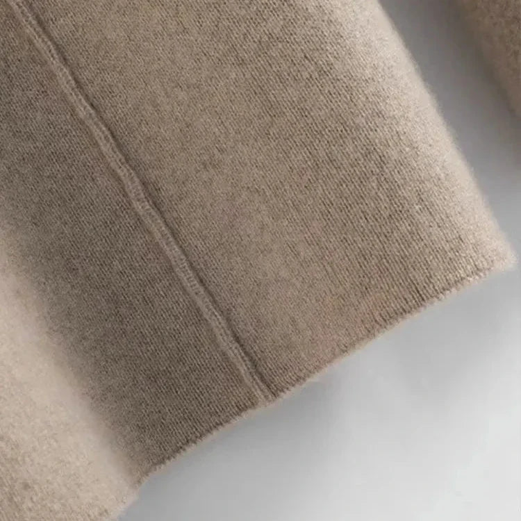 Heathers beige knit lounge pants hem and side seam detail.