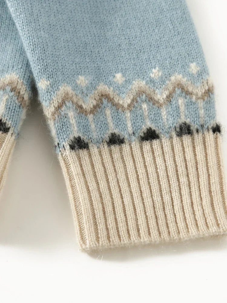 Sky blue Fair Isle sweater hem with cream rib knit and zigzag pattern