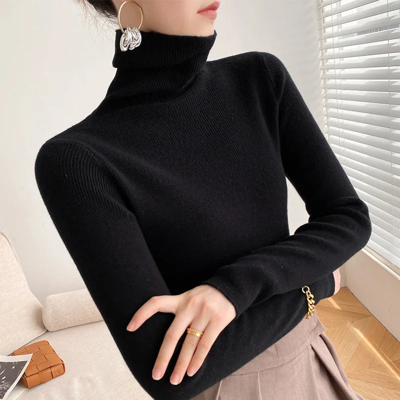 Black cashmere turtleneck sweater with ribbed knit and long sleeves