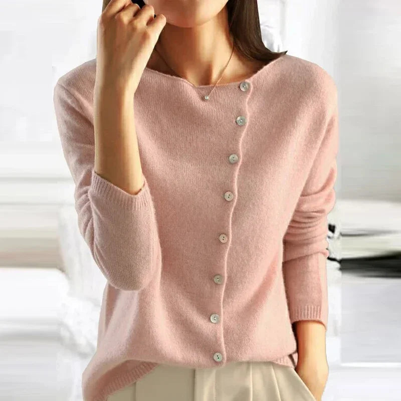 Pink asymmetrical button-front knit sweater, V-neckline, long sleeves, ribbed cuffs