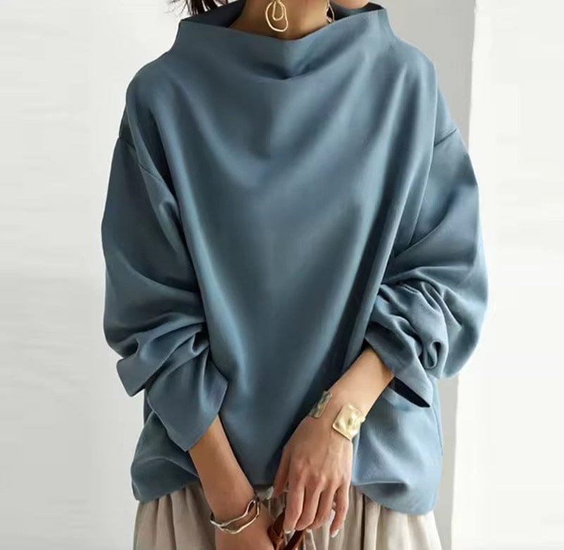 Blue high-neck casual top with long sleeves and relaxed draped fit