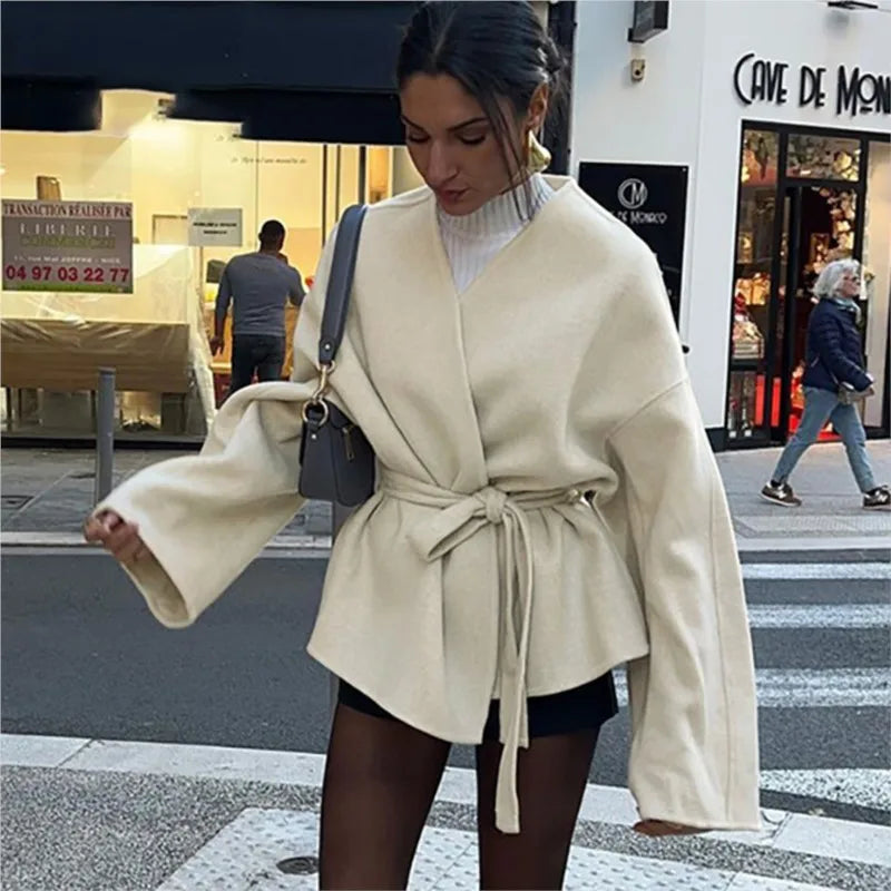 Ivory women’s wrap coat with tie waist and batwing-style sleeves