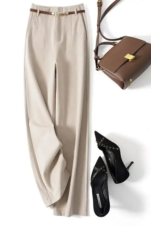 White high-waisted wide-leg trousers with a smooth waistband and side drape