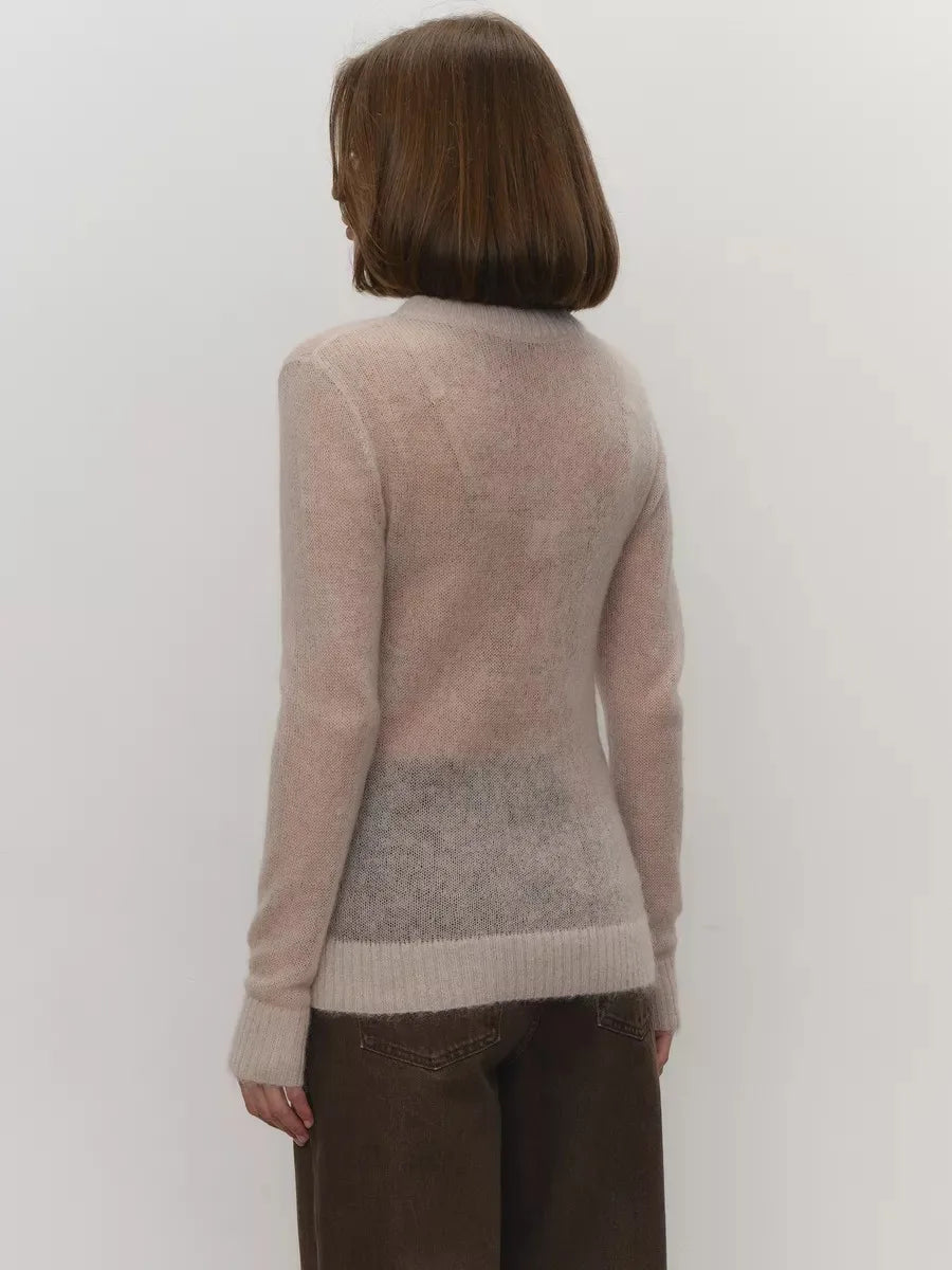 Back view of lightweight crewneck knit sweater in light beige with ribbed hem and cuffs