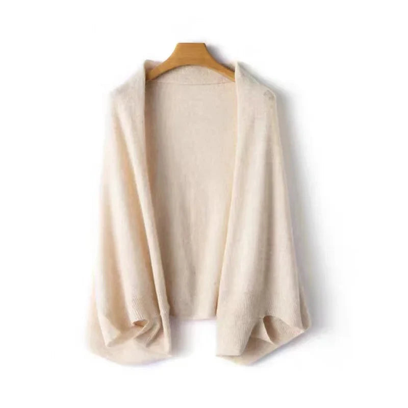 Wool-cashmere blend shawl wrap, light cream tone, folded flat with open front