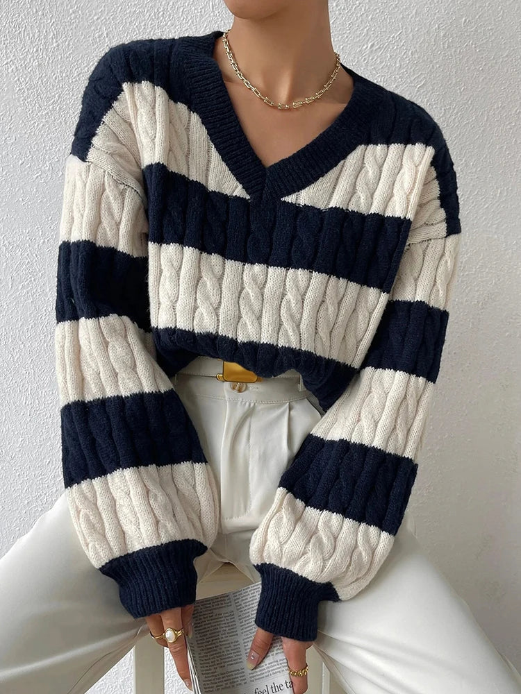 Striped V-neck cable knit sweater in cream and navy, wide horizontal bands