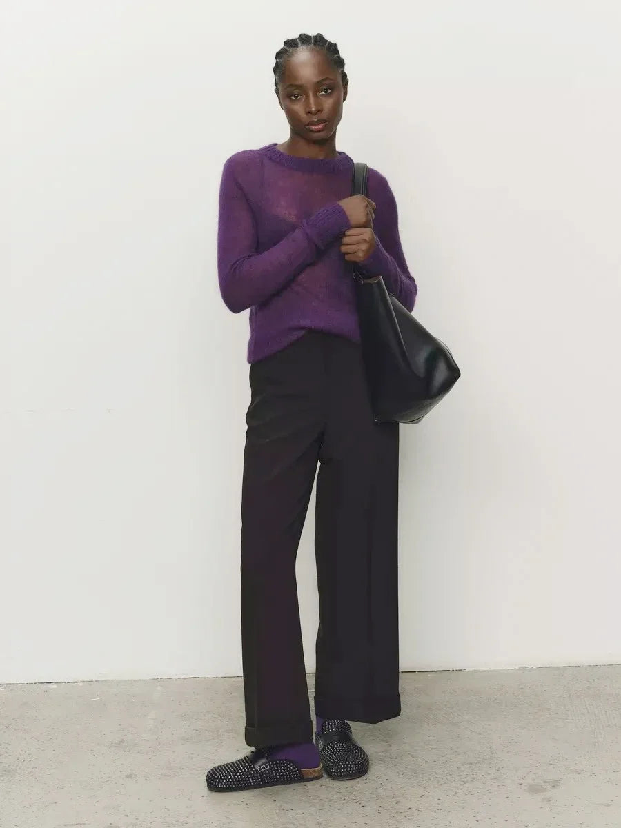 Purple crewneck knit sweater with long sleeves and ribbed cuffs