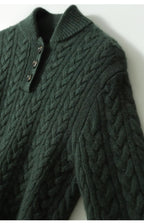 Dark green cable-knit cashmere sweater with three-button placket and ribbed cuffs