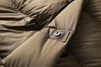 Long down puffer parka with hood, dark brown pocket flap with metal snap