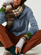 Blue waffle knit hoodie with hood and front zip; worn with plaid cuff mittens.