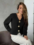 Women’s boxy V-neck cardigan sweater in black with gold-tone button front