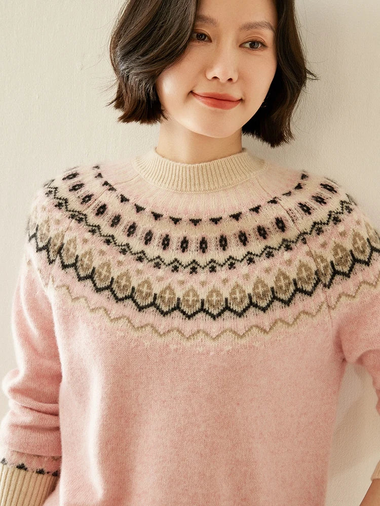 Pink fair isle knit sweater with mock neck and multi-color zigzag yoke pattern