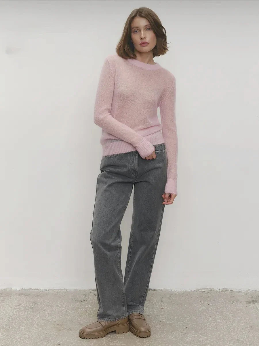 Light pink crewneck knit sweater, long sleeves, ribbed crew neckline and hem