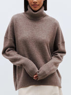 Taupe oversized merino-wool blend turtleneck sweater, long sleeves with ribbed cuffs