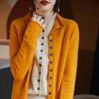 Women’s merino wool button cardigan, mustard orange with button front and long sleeves